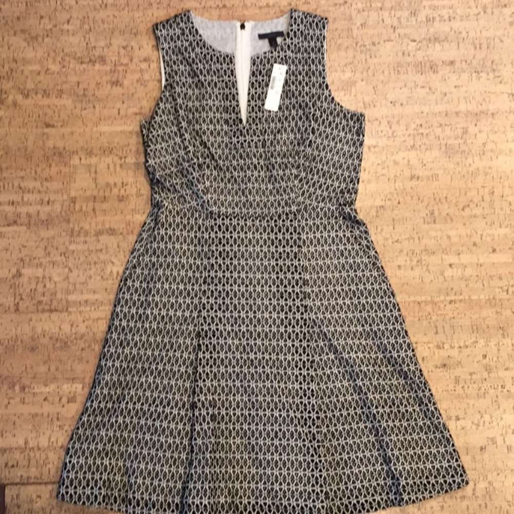 Black and white eyelet fit and flare dress